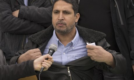 Ehsanula Safi, an Afghan migrant, describes how he lost five relatives off Farmakonisi. Photograph: Nikolas Georgiou/Demotix/Corbis