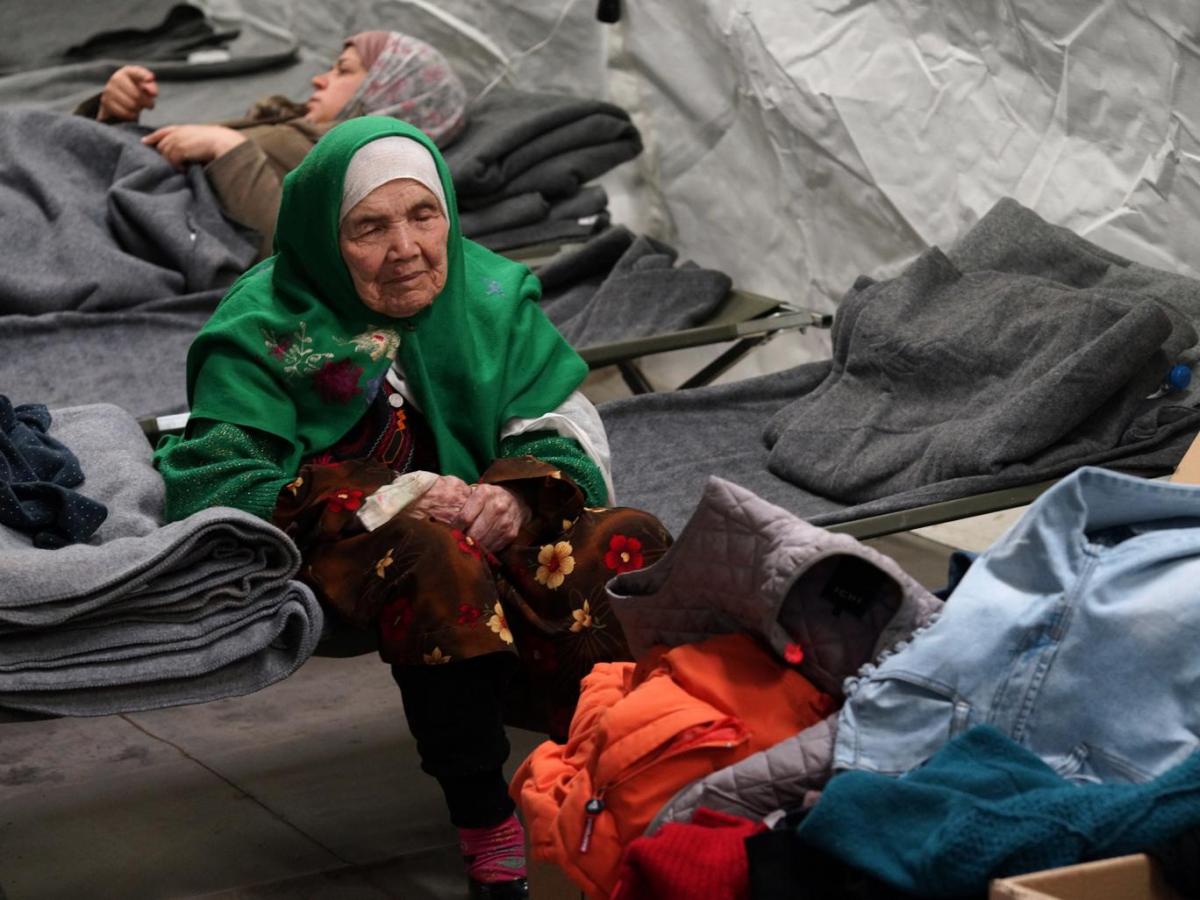Bibihal Uzbeki, 105, from Kunduz, Afghanistan, rests in Croatia's main refugee camp at Opatovac, Croatia, near the border with Serbia AP